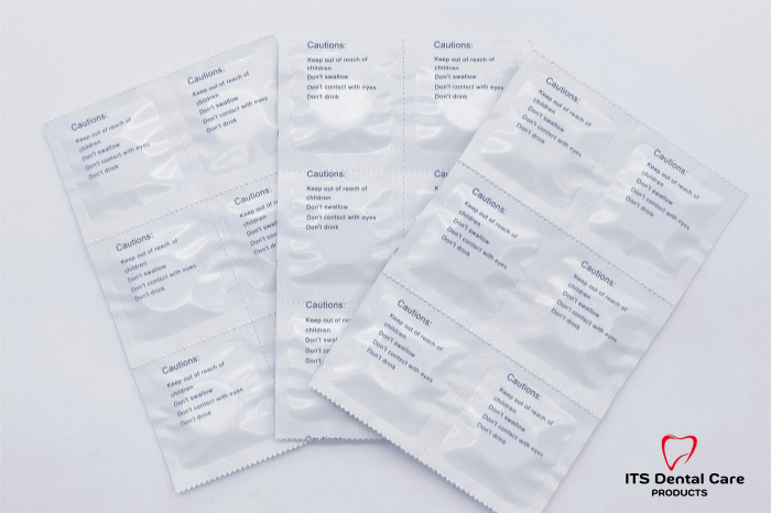 Printed foil sachet strips for denture cleaning tablets with ITS Dental logo