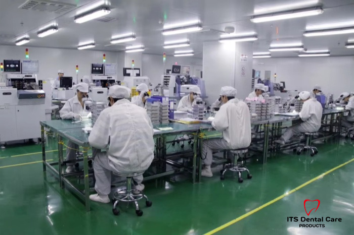 Denture tablet packaging area at ITS Dental with transparent-background logo
